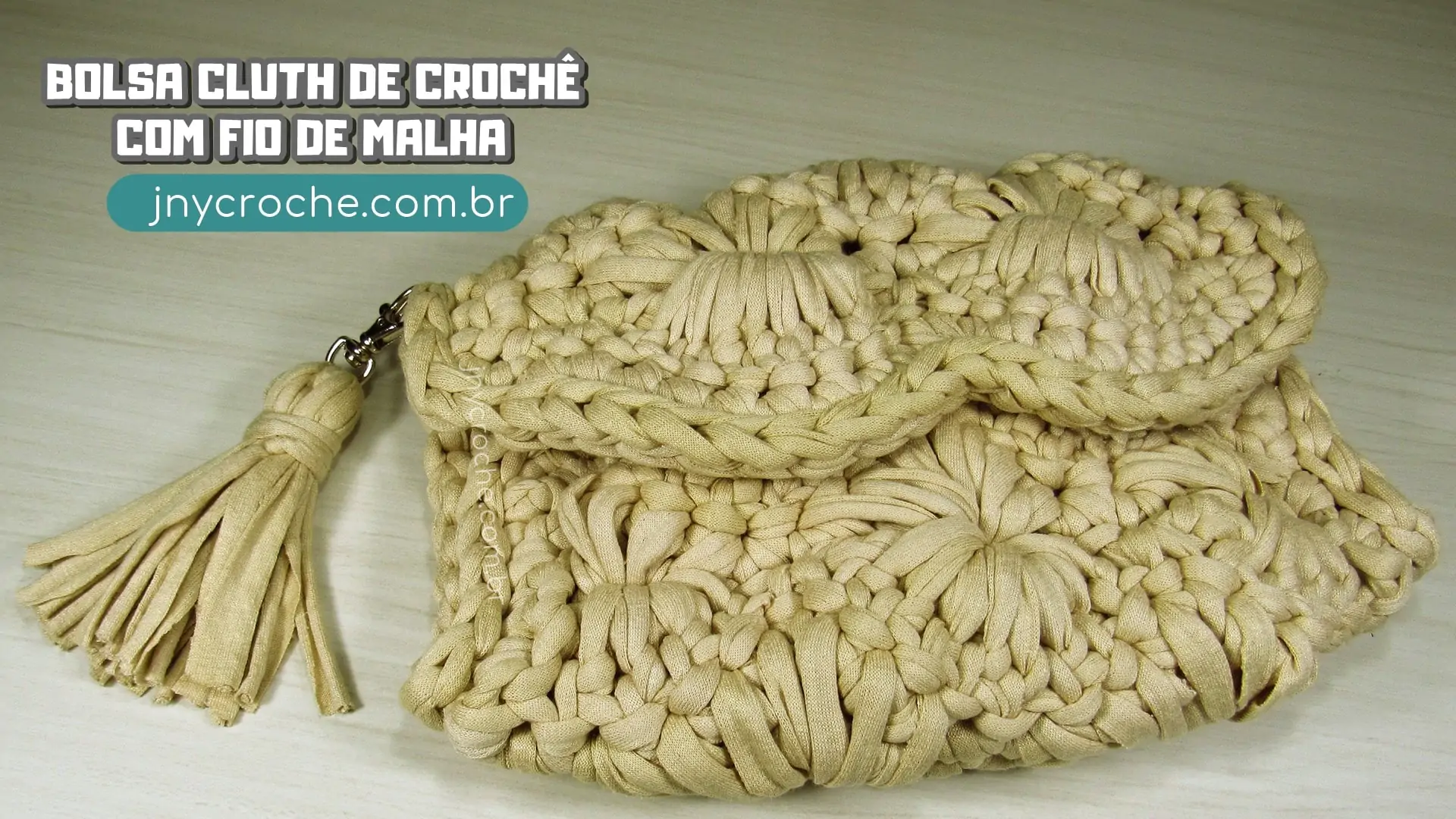 Bolsa cluth de crochê em fio de malha | CLUB