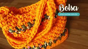 Bolsa de croche laranja com fio de malha